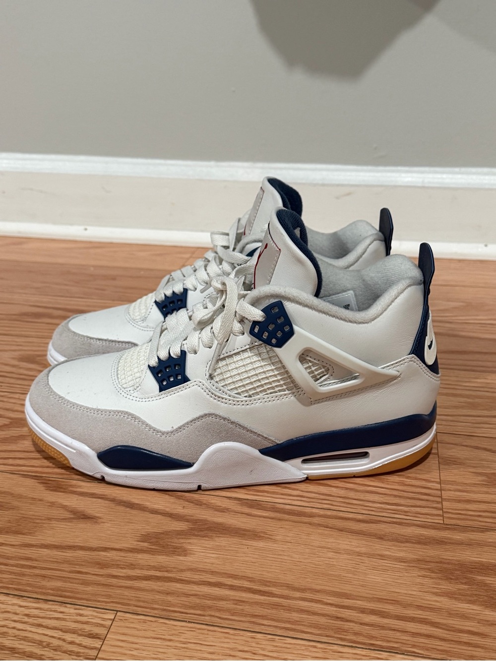 Jordan Retro High-Top Sneakers in White and Navy